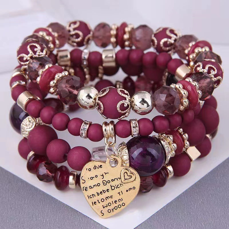 Chic Multilayer Bohemian Stretch Bracelet - Women's Hand Jewelry with Peach Heart Beads, Adjustable, Comfortable, and Stylish Accessory for Everyday Wear