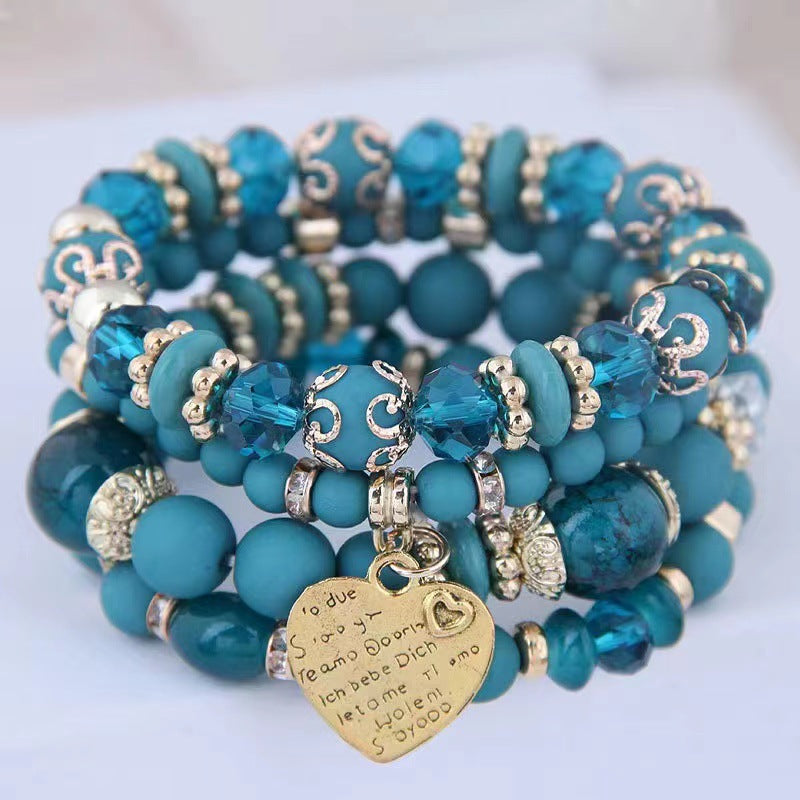 Chic Multilayer Bohemian Stretch Bracelet - Women's Hand Jewelry with Peach Heart Beads, Adjustable, Comfortable, and Stylish Accessory for Everyday Wear