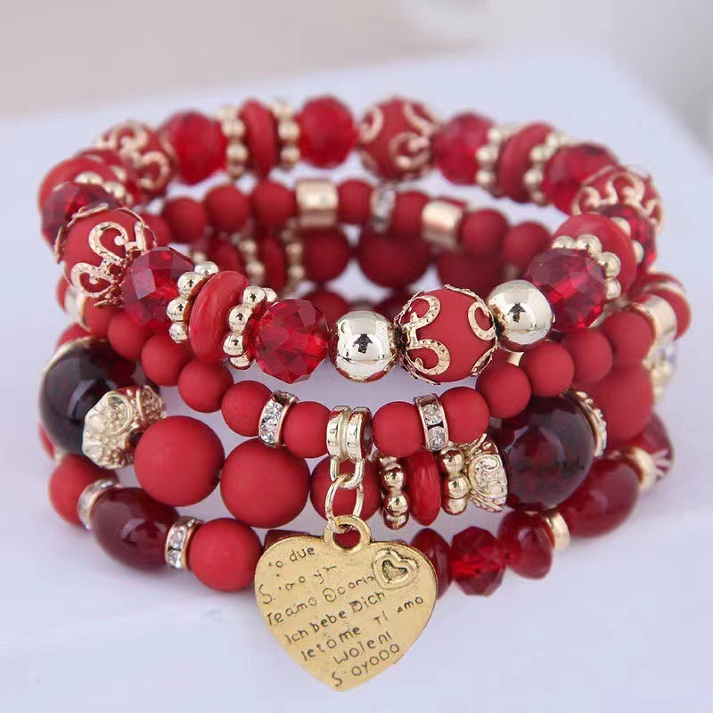 Chic Multilayer Bohemian Stretch Bracelet - Women's Hand Jewelry with Peach Heart Beads, Adjustable, Comfortable, and Stylish Accessory for Everyday Wear