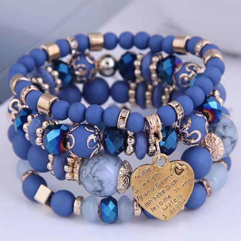 Chic Multilayer Bohemian Stretch Bracelet - Women's Hand Jewelry with Peach Heart Beads, Adjustable, Comfortable, and Stylish Accessory for Everyday Wear
