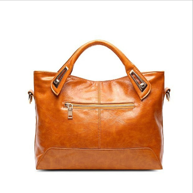 2025 Women's bag 2021 new handbag fashionable commuter PU women's bag retro oil wax leather Popular trade oblique span shoulder bag