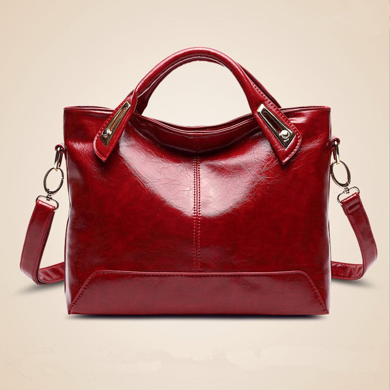 2025 Women's bag 2021 new handbag fashionable commuter PU women's bag retro oil wax leather Popular trade oblique span shoulder bag