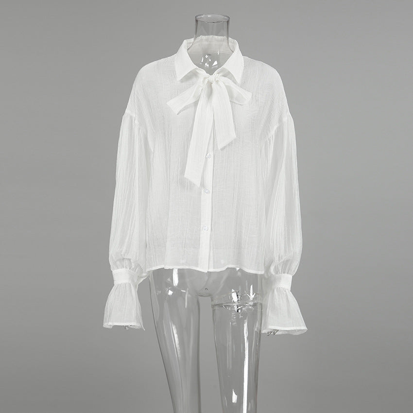 XAKXX Autumn and winter Russian high-end temperament bow tie sexy see-through crepe horn sleeve casual women's shirt