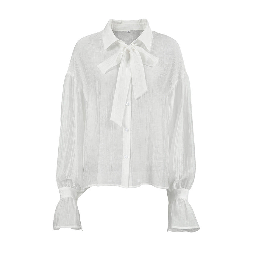 XAKXX Autumn and winter Russian high-end temperament bow tie sexy see-through crepe horn sleeve casual women's shirt