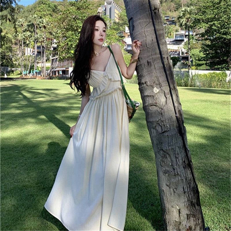 2025 high-end white suspender dress women's summer new temperament thin gentle wind seaside vacation dress