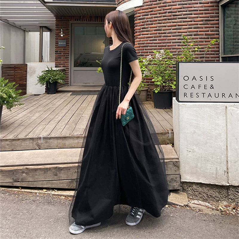 Black Hepburn short-sleeved knitted dress women's summer waist thin mesh stitching temperament long skirt