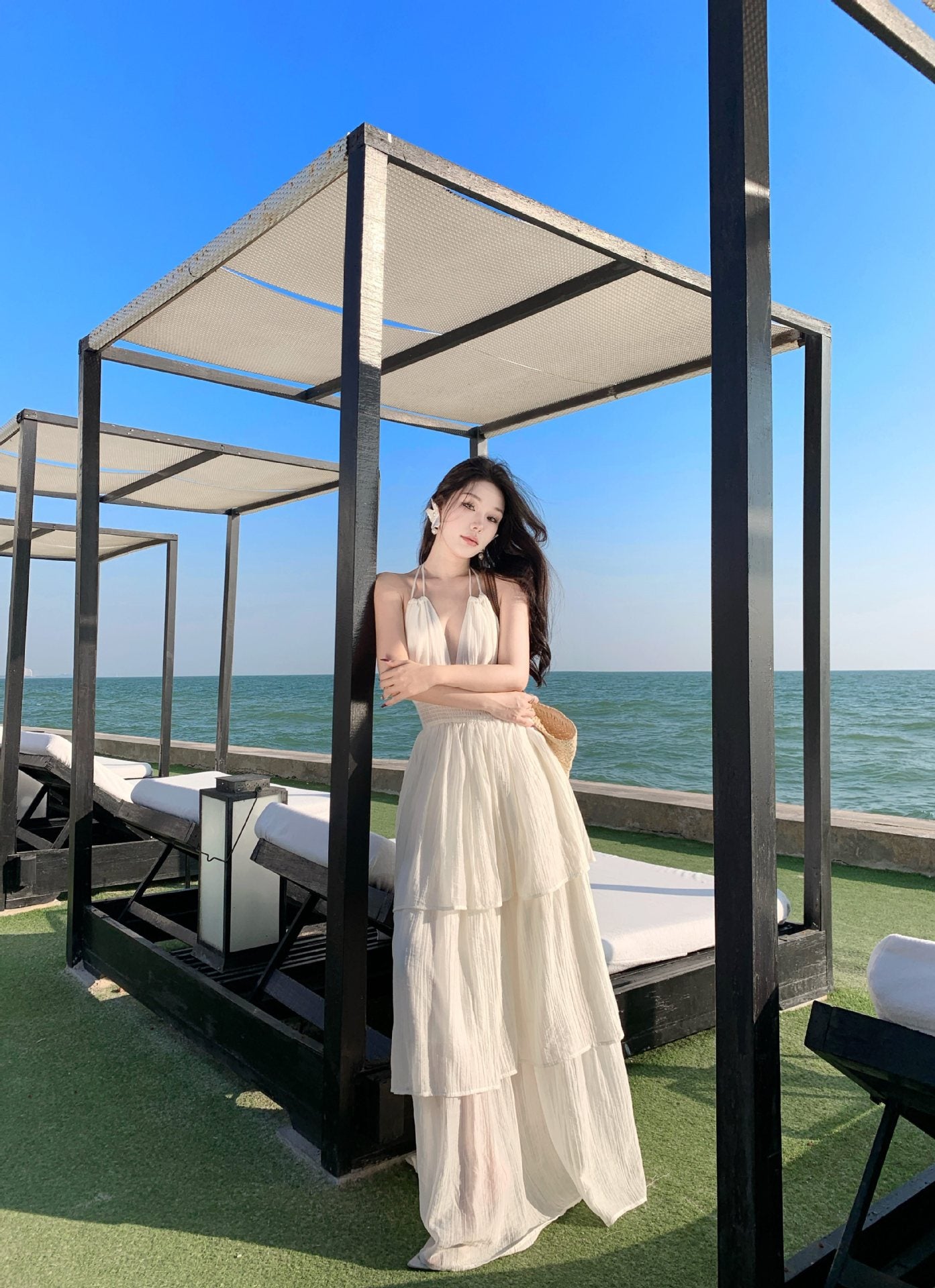 2025 Seaside vacation atmosphere dress women's pleated deep V neck long dress pure desire wind sexy big backless lace dress