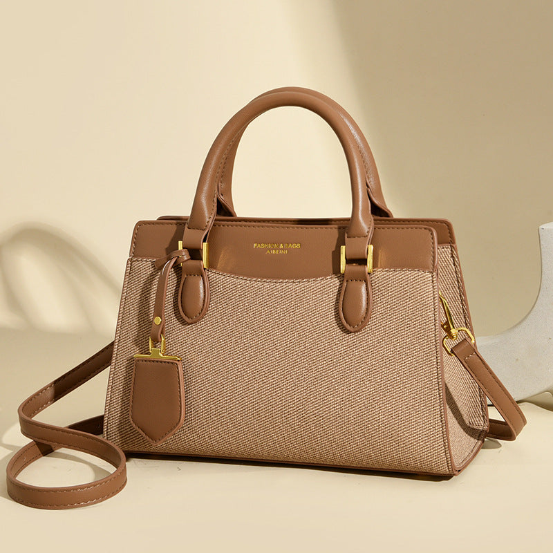 Bag autumn new simple temperament women's handbag canvas splicing contrasting color shoulder bag commuter messenger bag