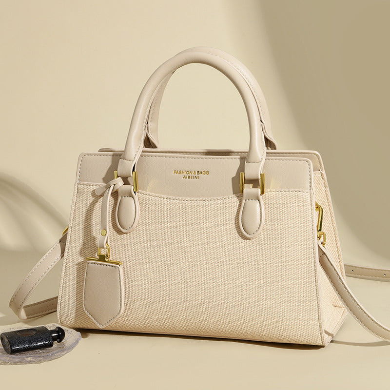 Bag autumn new simple temperament women's handbag canvas splicing contrasting color shoulder bag commuter messenger bag