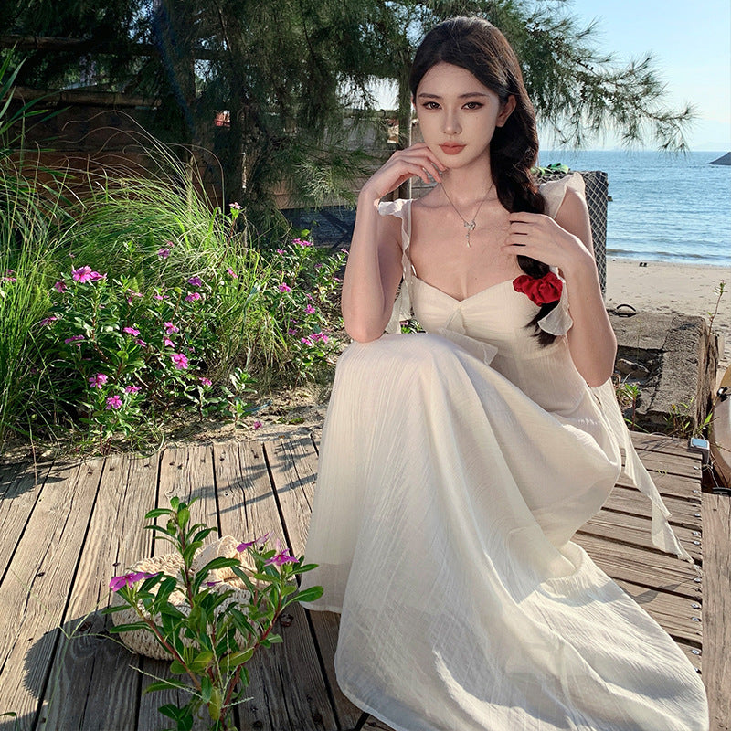 2025 small fly sleeve ruffle edge strap backless suspender dress female summer vacation wind fairy big swing a-word skirt