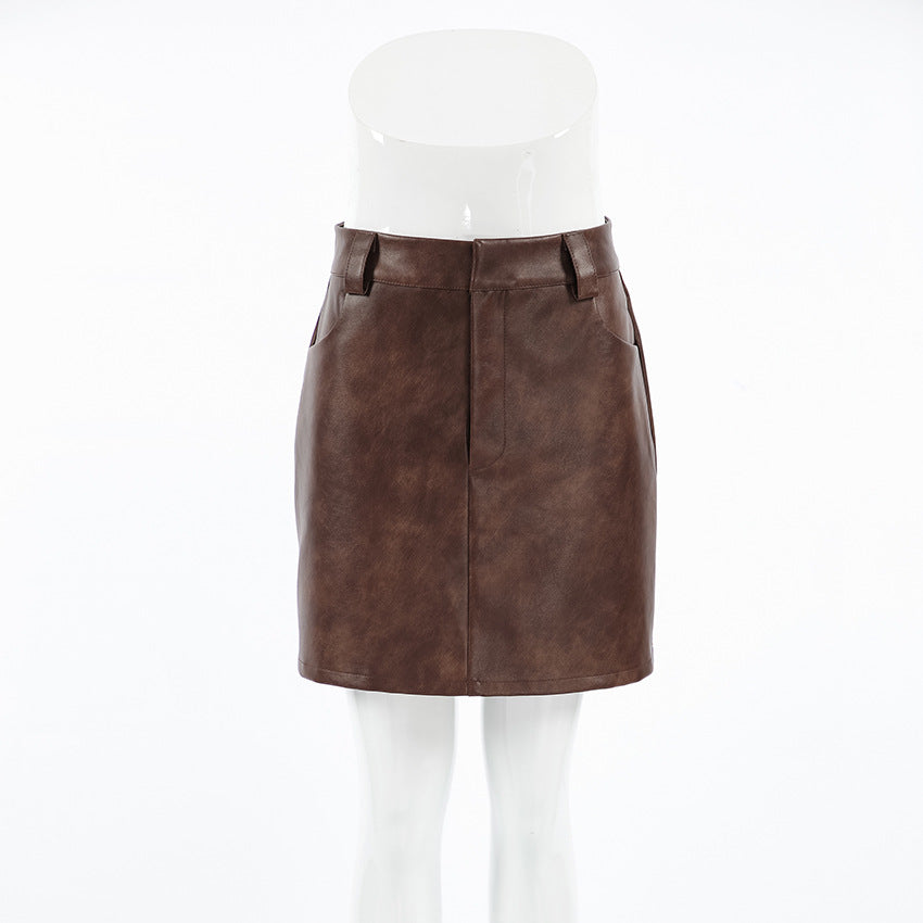 XAKXX Autumn and winter retro high-end brown faux leather high-waisted straight skirt 2025 temperament PU short skirt women