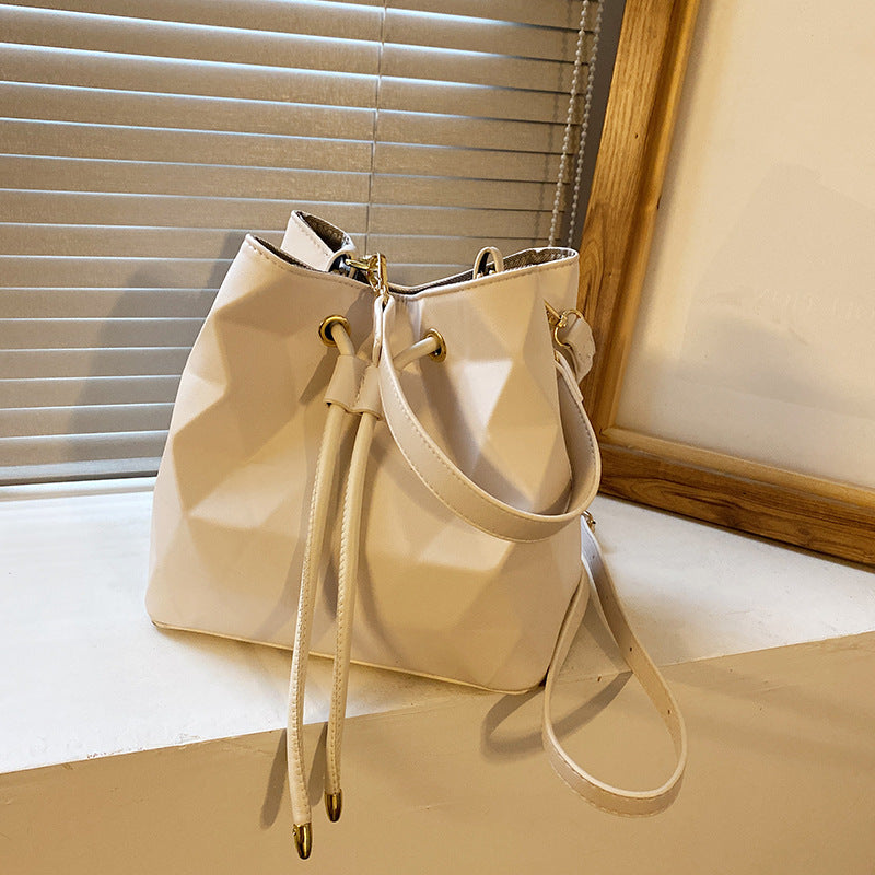 XAKXX 2025 Bucket bag new Korean version l pleated casual handbag Internet celebrity popular Popular style women, shoulder messenger bag