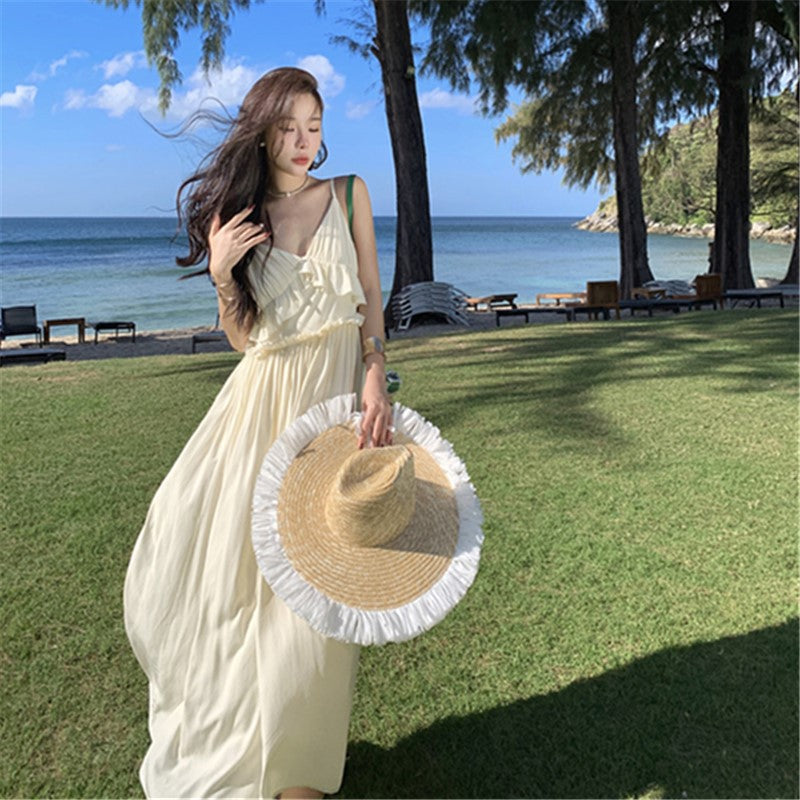 2025 high-end white suspender dress women's summer new temperament thin gentle wind seaside vacation dress