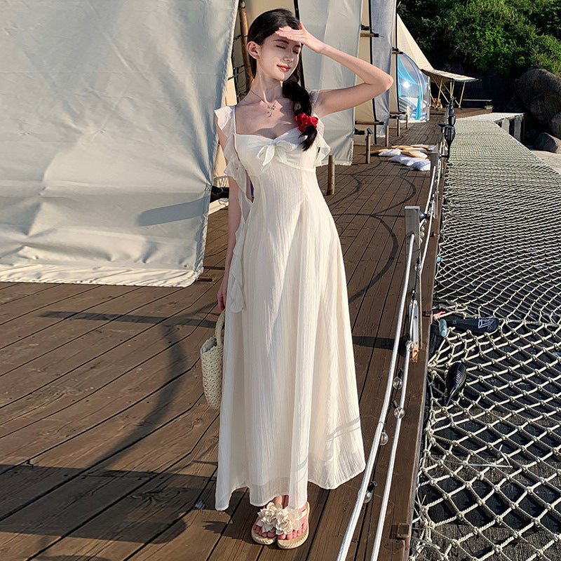 2025 small fly sleeve ruffle edge strap backless suspender dress female summer vacation wind fairy big swing a-word skirt