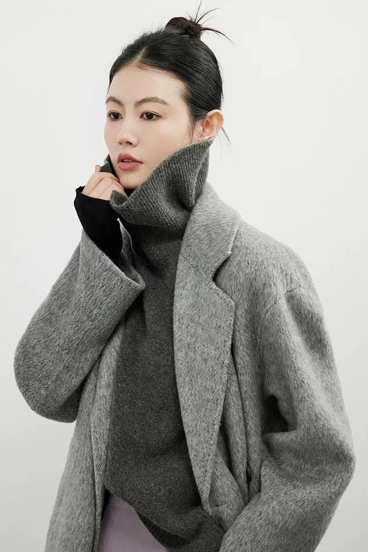 xakxx xakxx- artistic cashmere vest is free and easy to look at, with a sense of design. Wool turtleneck knit.