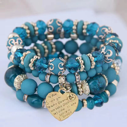 Chic Multilayer Bohemian Stretch Bracelet - Women's Hand Jewelry with Peach Heart Beads, Adjustable, Comfortable, and Stylish Accessory for Everyday Wear