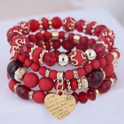 Chic Multilayer Bohemian Stretch Bracelet - Women's Hand Jewelry with Peach Heart Beads, Adjustable, Comfortable, and Stylish Accessory for Everyday Wear