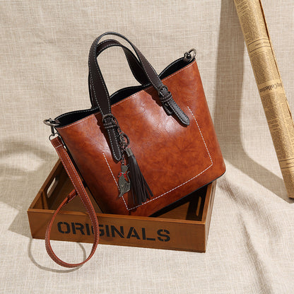 2025 Hot trade new women's bags fashion trend women's bags handbags Korean pendant fringed large bucket bag retro shoulder bag