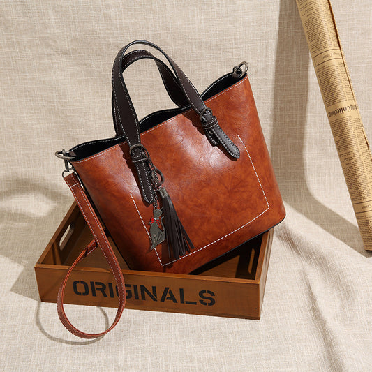 2025 Hot trade new women's bags fashion trend women's bags handbags Korean pendant fringed large bucket bag retro shoulder bag