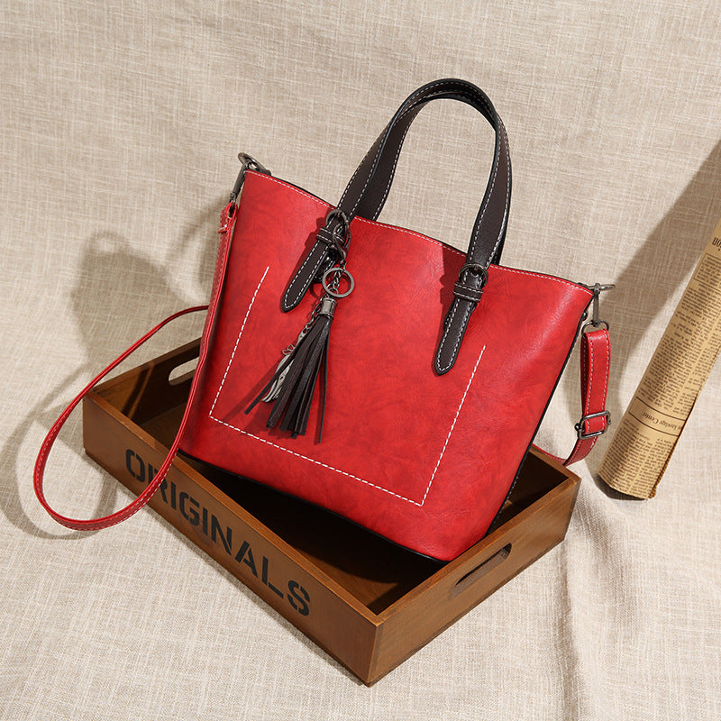 2025 Hot trade new women's bags fashion trend women's bags handbags Korean pendant fringed large bucket bag retro shoulder bag