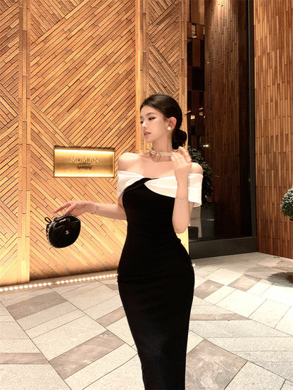 2025 one-word shoulder dress women's summer black and white splicing waist slim temperament annual meeting evening dress hip-wrapped dress