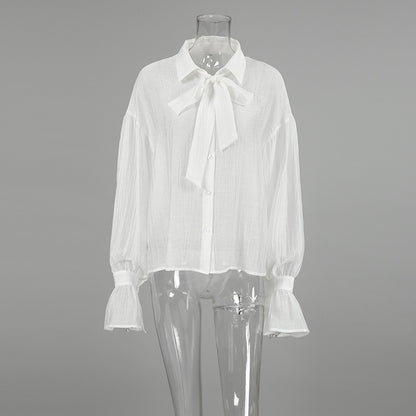 XAKXX Autumn and winter Russian high-end temperament bow tie sexy see-through crepe horn sleeve casual women's shirt