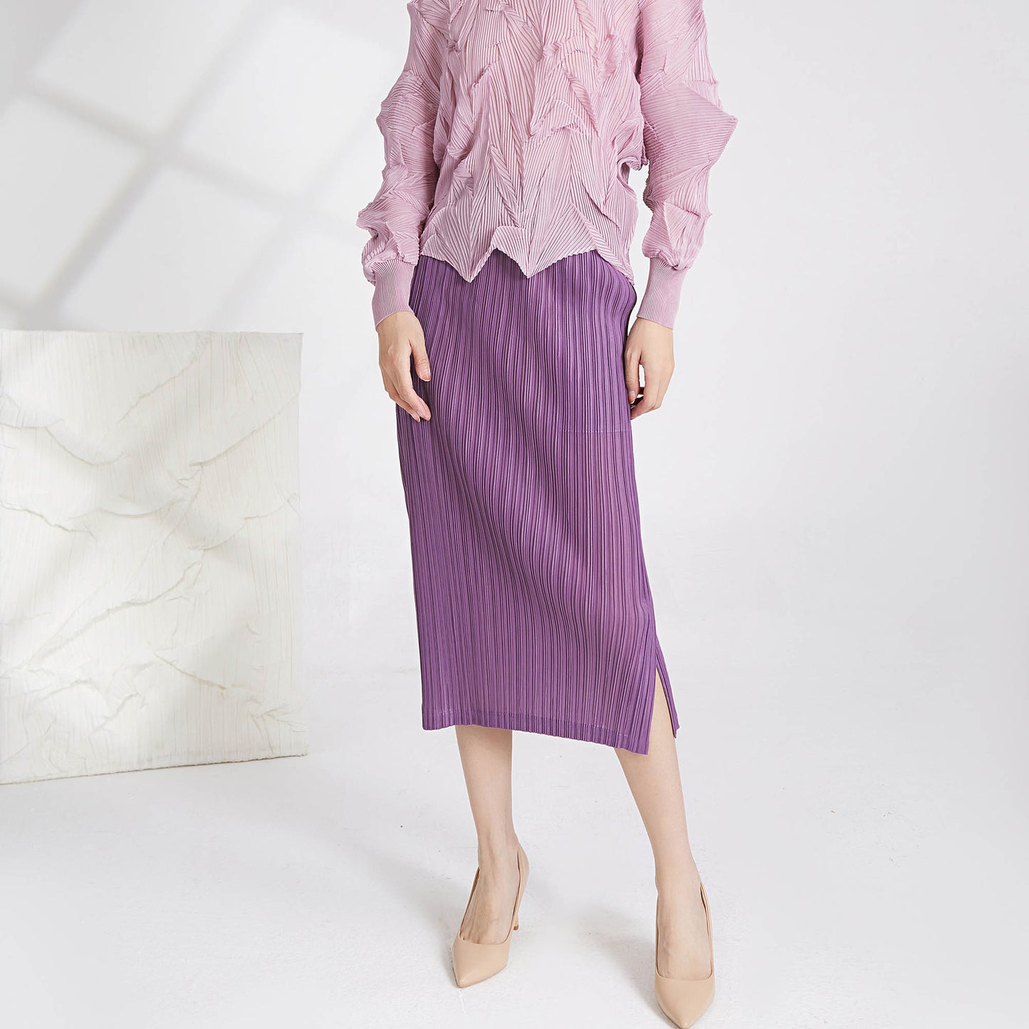 2025 skirt spring women's small Shenzhen Nanyou women's clothing wholesale high-end split fork medium and long hip skirt