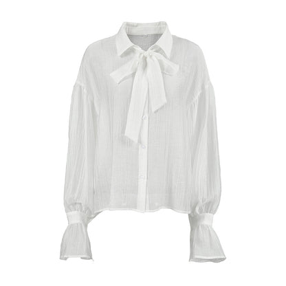 XAKXX Autumn and winter Russian high-end temperament bow tie sexy see-through crepe horn sleeve casual women's shirt