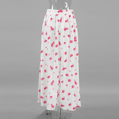 XAKXX Spring and summer fashionable and sexy design sense pink print split fork high waist commuter half-body Russian commuter women's dress