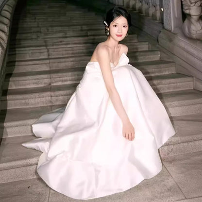 2025 light evening dress female niche light luxury high sense white bar mitzvah banquet host vocal art test tube top