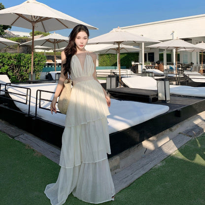 2025 Seaside vacation atmosphere dress women's pleated deep V neck long dress pure desire wind sexy big backless lace dress