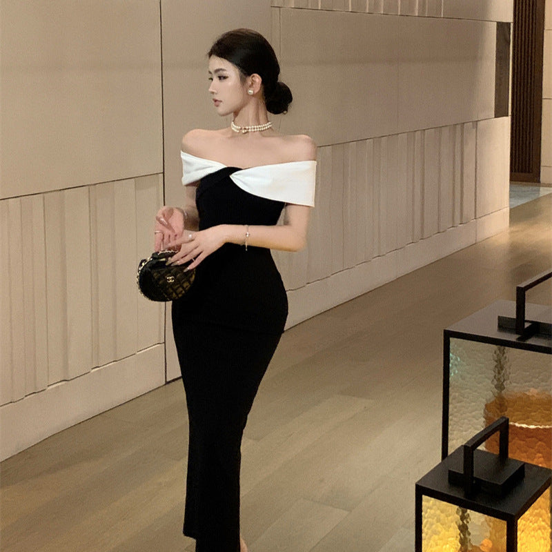 2025 one-word shoulder dress women's summer black and white splicing waist slim temperament annual meeting evening dress hip-wrapped dress