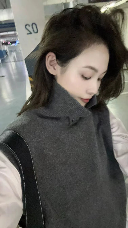 xakxx xakxx- artistic cashmere vest is free and easy to look at, with a sense of design. Wool turtleneck knit.