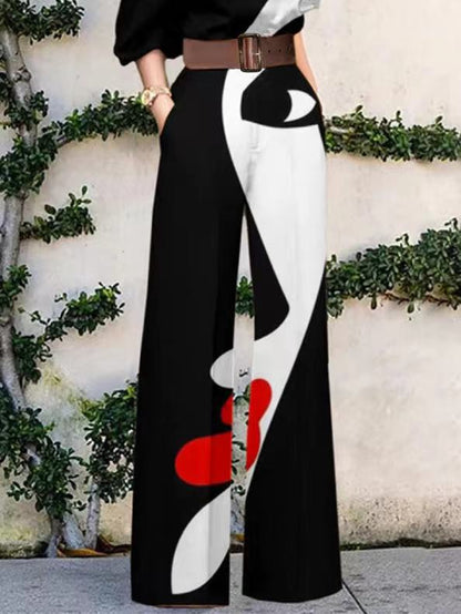 xakxx Half Sleeves Loose Contrast Color Face Printed Belted One-Shoulder Jumpsuits