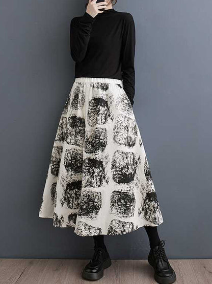 xakxx A-Line Loose Contrast Color Elasticity Printed Split-Joint Skirts