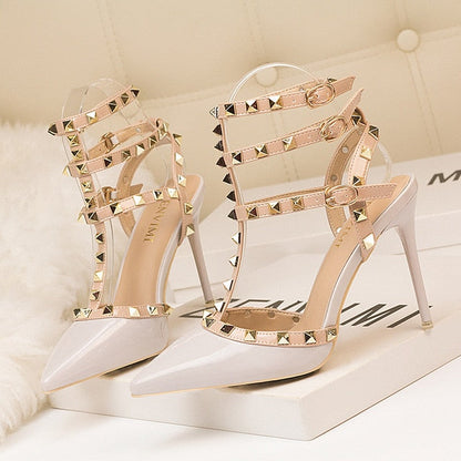 Roman fashion rivet sandals 10CM PUMPS Woman shoes Sexy nightclub stiletto heels patent-leather metallic rivet hollow